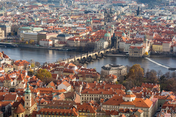 Fototapeta na wymiar The traditional old town of Prague with the Vltava River and the Charles Bridge from above
