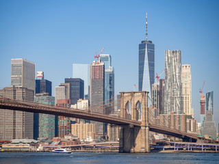 Brooklyn bridge, New York, USA - September 2019: [ Brooklyn bridge architecture with panoramic view of New York City and lower Manhattan, One World Trade Center, Dumbo ]