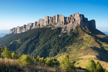 Fototapeta na wymiar Caucasian mountains of the Republic of Adygea, Krasnodar region. South of Russia. Beautiful foothills of the Caucasus. Thach Nature Park. Achenbuk mountain.