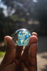 Sunlight coming through glass ball in Bangladesh