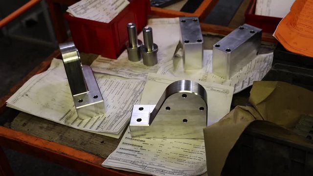 Metal parts with documentation at the CNC factory