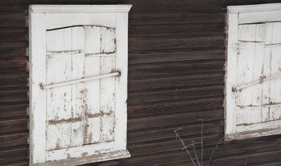Old wooden window with shutters