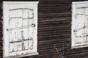 Old wooden window with shutters