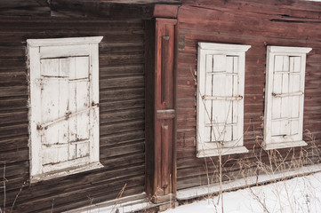 Old wooden window with shutters