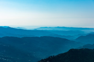 Series of blue Himalayan blue  mountains  during sunrise 