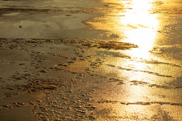Ice on the lake at dawn of the sun