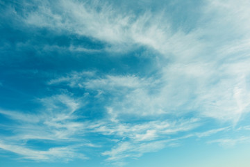 Naklejka na ściany i meble Beautiful Blue Sky Background With White Clouds
