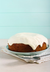 Classic carrot cake with frosting served