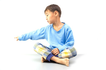 boy pointing side on white background