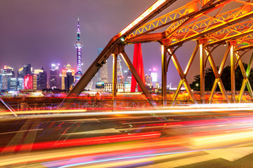 Fototapeta na wymiar Architectural landscape and colorful lights at night in Shanghai