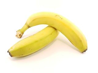 ripe yellow bananas on a white background
