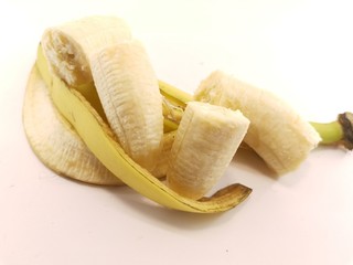 ripe yellow bananas on a white background