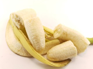 ripe yellow bananas on a white background
