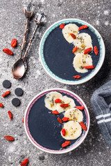 Black charcoal smoothie with goji