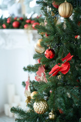 Christmas mood, Christmas tree, merry holidays. Christmas gift box, Blurred background, bokeh.