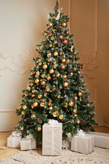 Christmas mood, Christmas tree, merry holidays. Christmas gift box, Blurred background, bokeh.