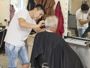 Hairdresser, master works with clients