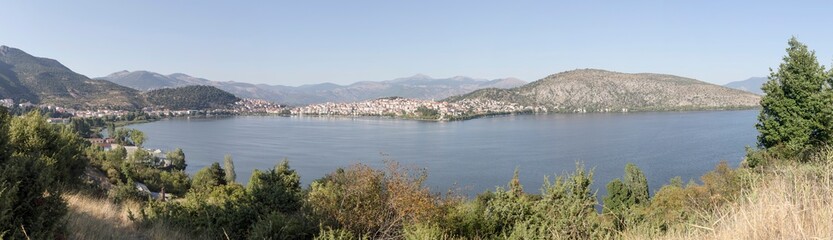 Panorama of a mountain lake and the city