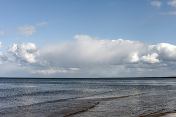 Fototapeta na wymiar Cloudy sky over gulf of Riga, Baltic sea.