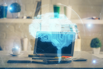 Double exposure of work table with computer and brain sketch hologram. Brainstorming concept.