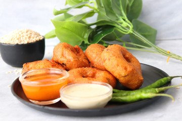 Vada or Medu vadai with sambar and coconut chutney - Popular South Indian snack. recipe ingredients with Copy space