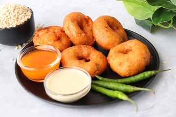 Vada or Medu vadai with sambar and coconut chutney - Popular South Indian snack. recipe ingredients with Copy space
