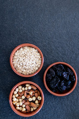 Healty, vegetarian dried fruit breakfast. Set of bowls with dried fruit to enrich a healthy vegan...