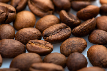 Coffee beans close-up background. Fresh roasted