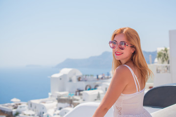Fototapeta na wymiar Trip on a Santorini, vacation concept, pretty woman rest in Greece 