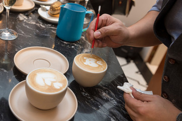 Drawing on the coffee foam by Master craftsman.