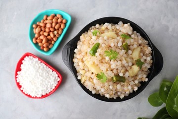 Indian Food dish made out of Sago called Sabudana khichdi, Usually eaten during fasting days. Recipe Ingredients along with copy space