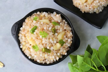 Indian Food dish made out of Sago called Sabudana khichdi, Usually eaten during fasting days. Recipe Ingredients along with copy space