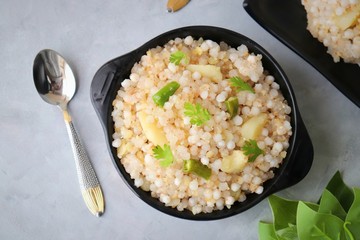 Indian Food dish made out of Sago called Sabudana khichdi, Usually eaten during fasting days. Recipe Ingredients along with copy space