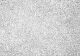 Texture of genuine leather. Suede leather texture closeup. Gray background.