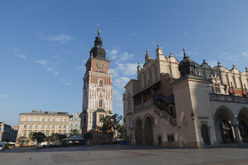 Fototapeta na wymiar KRAKOW, POLAND - MAY, 12, 2018: Central market square of old town with churches and historical buildings