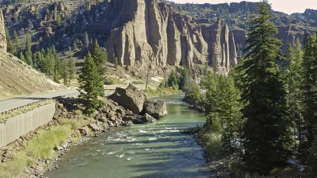 Aerial flying in Canyon and North Fork Highway that leads to the entrance of Yellowstone National Park. Wyoming, USA