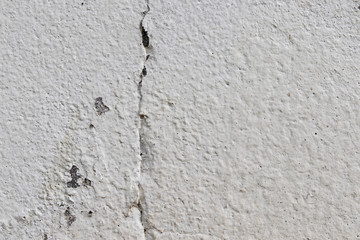 Abstract textured pattern concrete wall background with selective focus