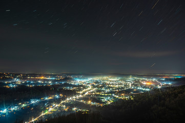 View of the night Ukrainian city in the fog