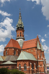 Fototapeta premium St. Joseph's Church built from red brick. Gothic architecture in Krakow, Poland.