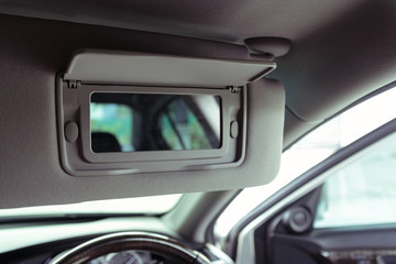 vanity mirror in modern car, selective focus