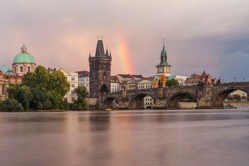 Fototapeta na wymiar Old Town Bridge Tower and Charles Bridge with Rainbow in the sky. Rainbow over the old town. Prague, Czech Republic.