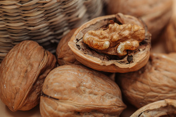 Healthy organic walnuts in a straw basket