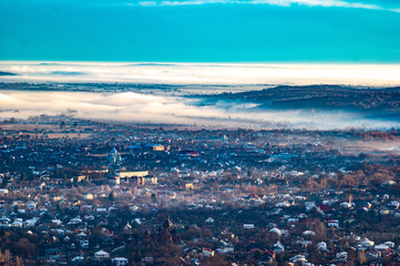 Morning city in the fog