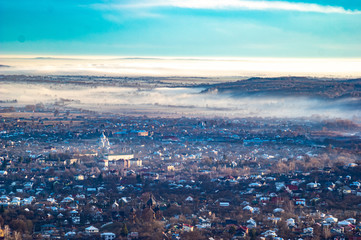 Morning city in the fog