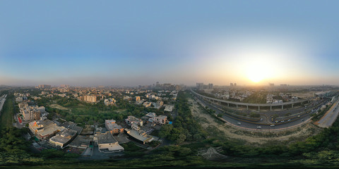 Fototapeta na wymiar Panoramic aerial view of Noida,gurgaon, india, Rapid metro tracks in urban areas of Delhi NCR. Cityscape.