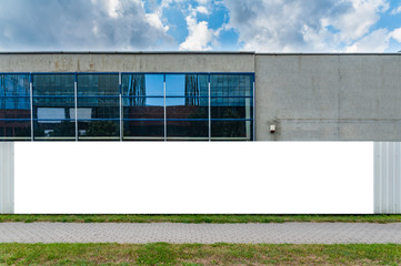 Advertising banner mockup on the fence of construction site