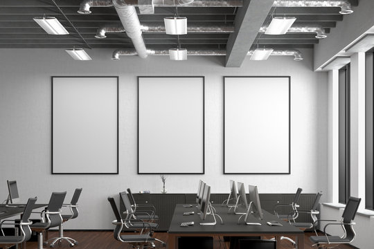 Three blank vertical posters mock up on the white wall in office interior. 3d render.