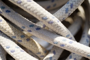 Rope wound around winch on sailboat