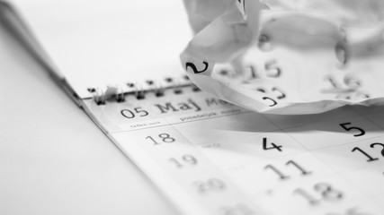 Close up of a calendar and dates on it.