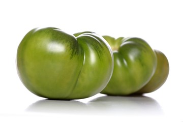 Studio shot of green tomato